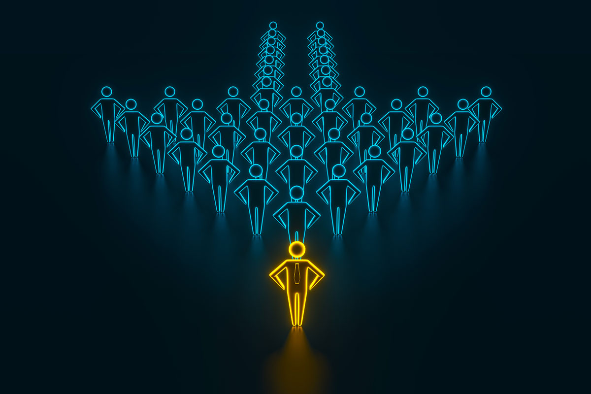 yellow leader figure in front of group of blue figures forming an arrow